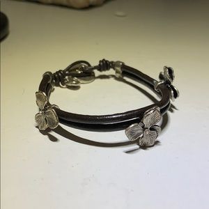 Fossil leather bracelet with silver flowers